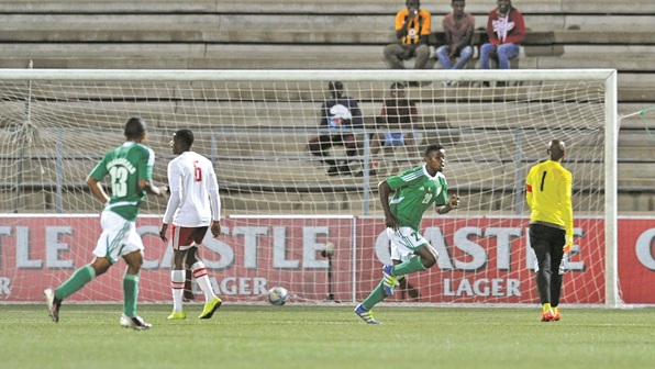 Malagasy Fanomezana Tojo Claudel (right) celebrates his goal against Seychelles ©Muzi Ntombela/BackpagePix
